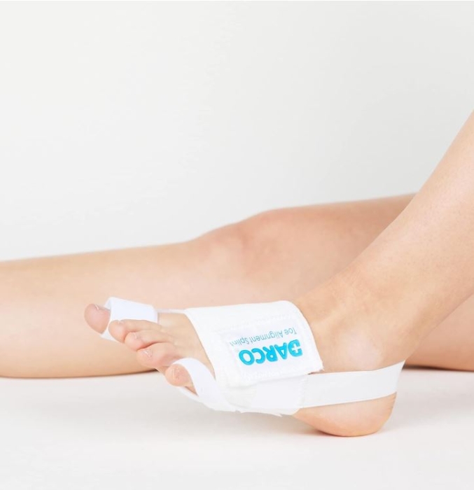 DARCO Toe Alignment Splint fitted on foot showing toe loops, metatarsal band and heel strap