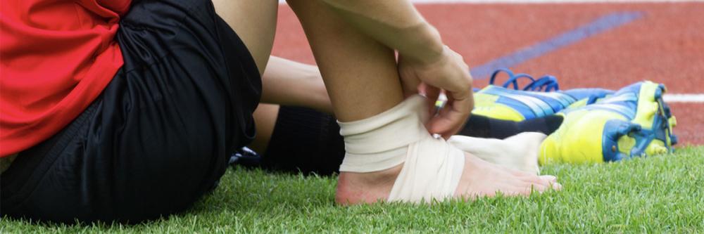 Sportsman with sprained ankle