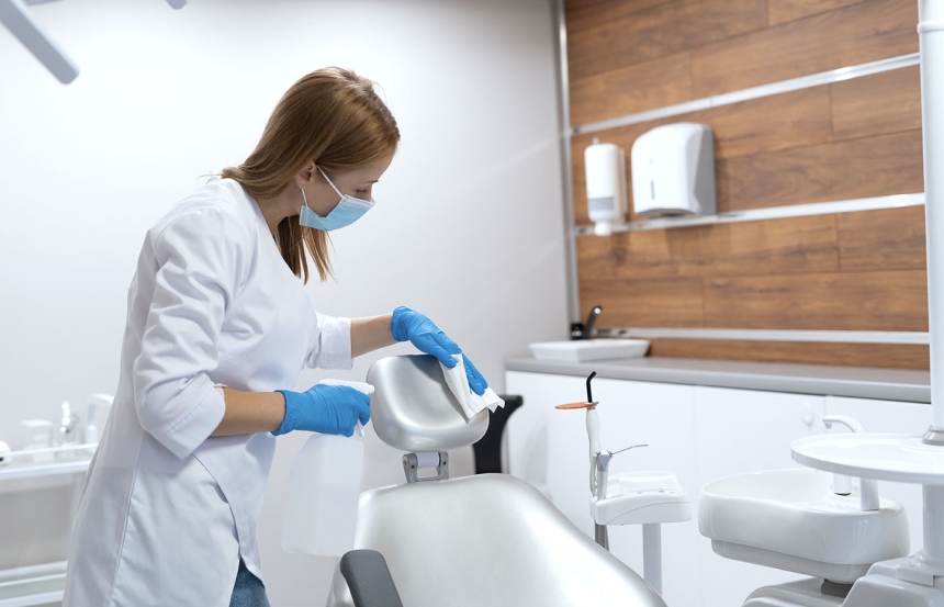 Cleaning podiatry chair with clinell wipes