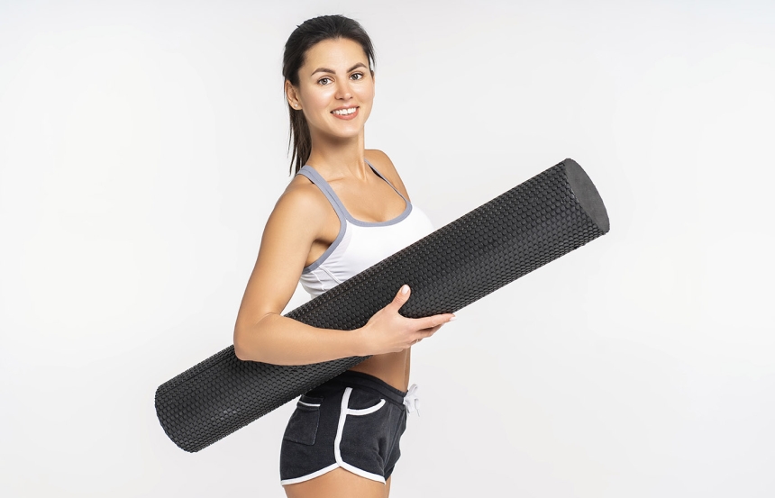 Lady with black foam roller