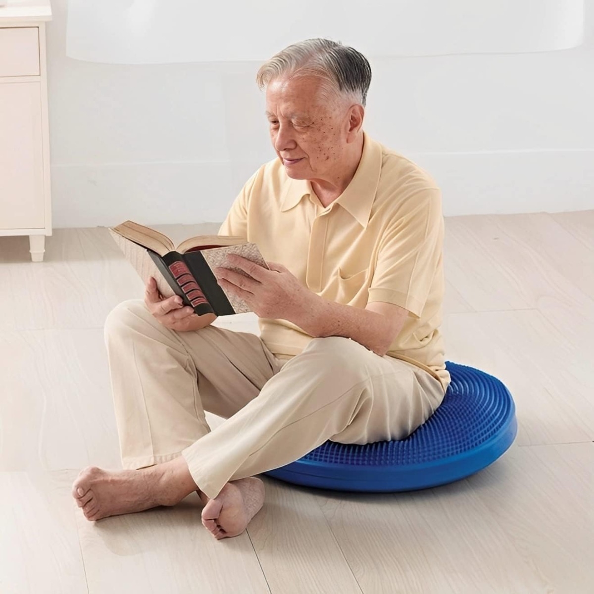 Sensory Tactile Air Wobble Cushion 60cm with man reading book