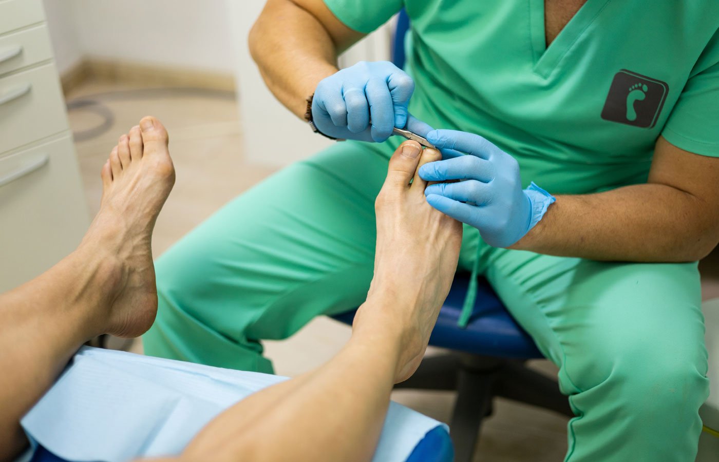 Podiatrist Working on Toenails